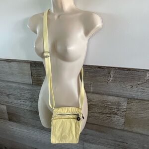 Kipling pale yellow crossbody bag purse